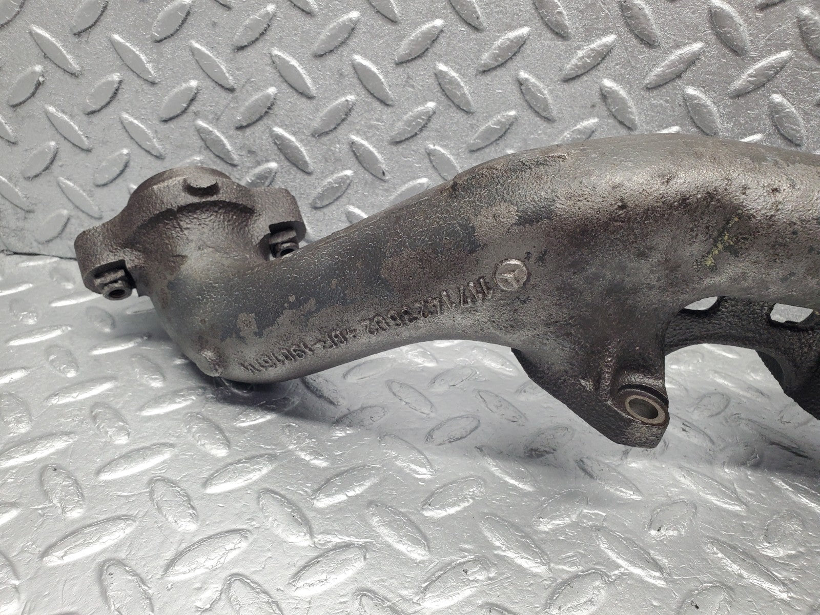 W126 Coupe exhaust manifold left used OEM