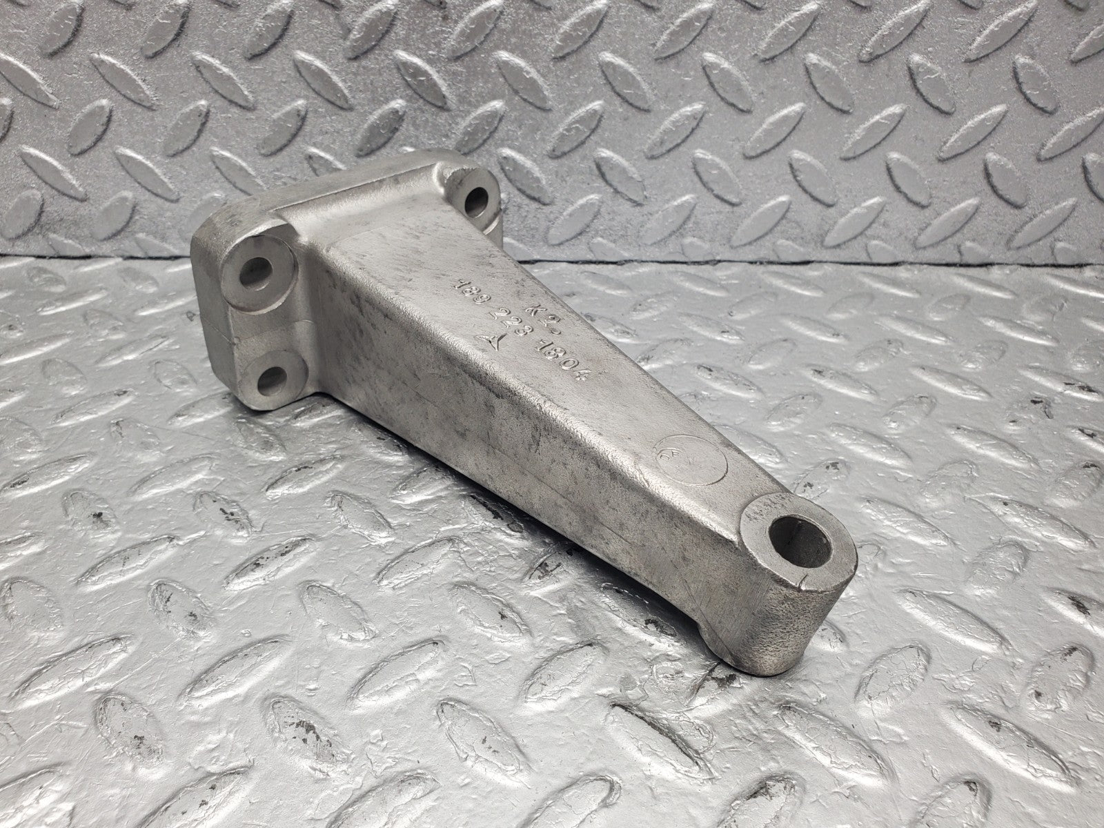 W112 engine mount bracket right side used OEM