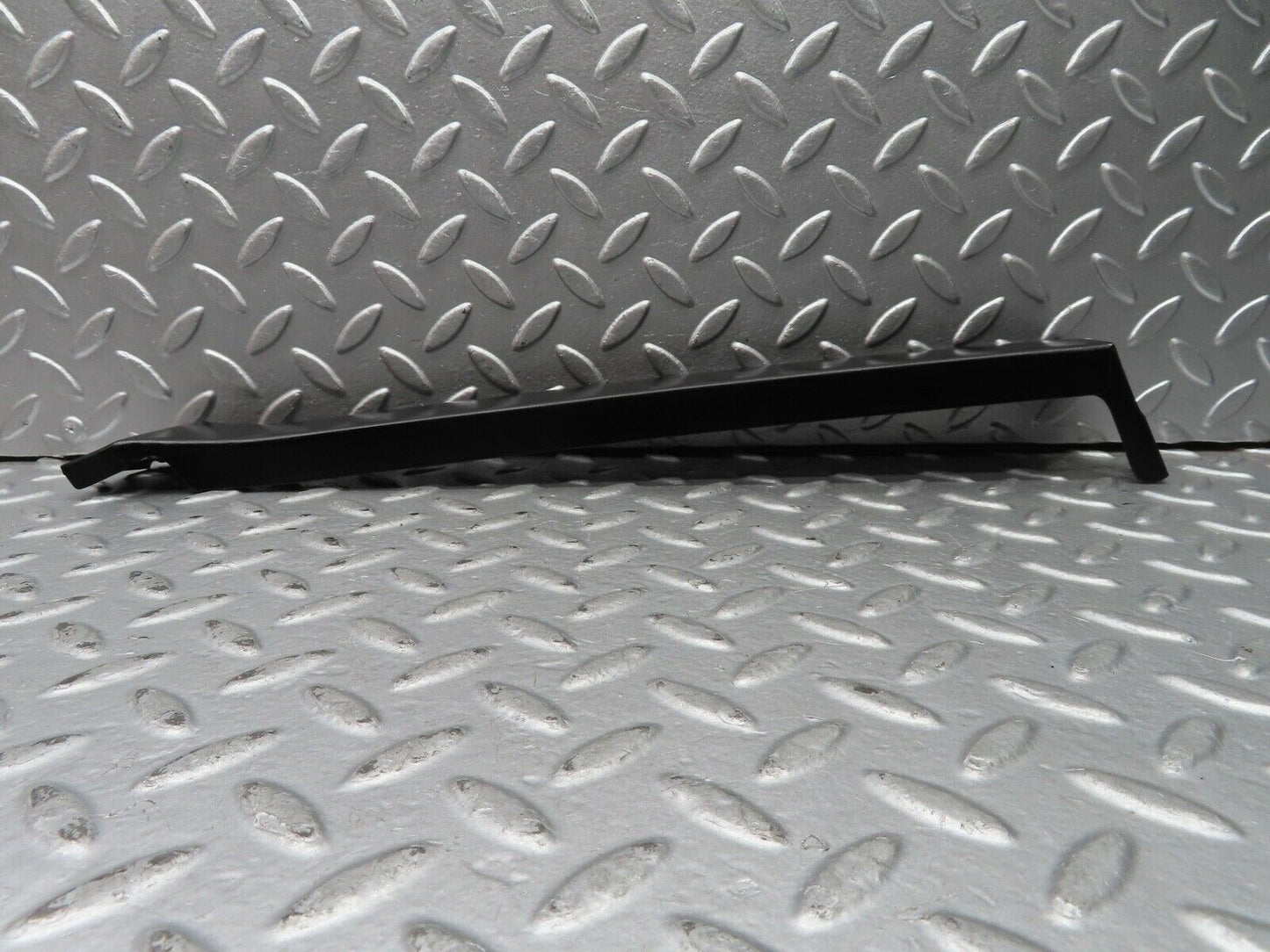 21682 Mercedes-Benz W126 300SE Left Headlight Lower Trim