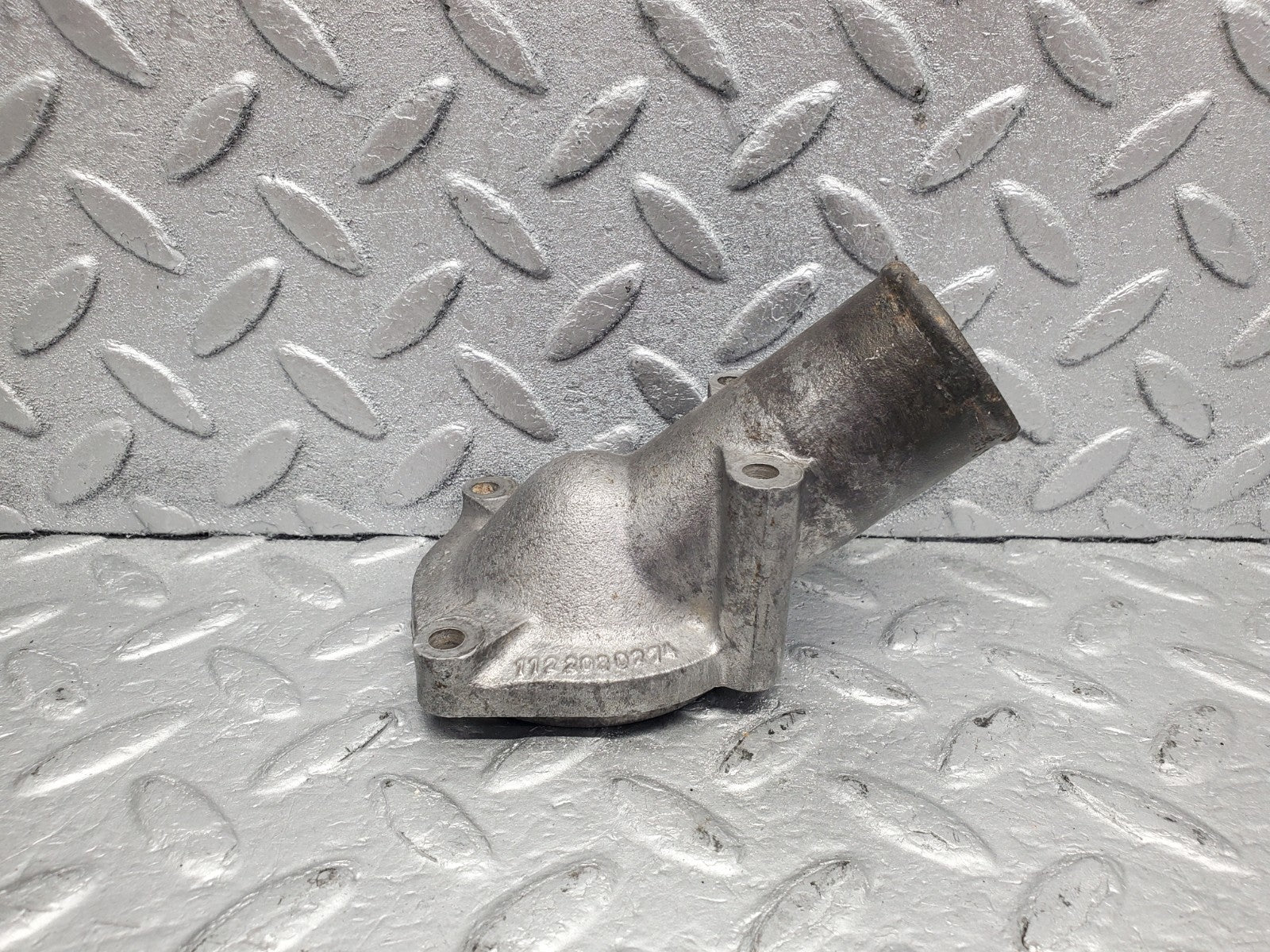 W112 thermostat housing used OEM