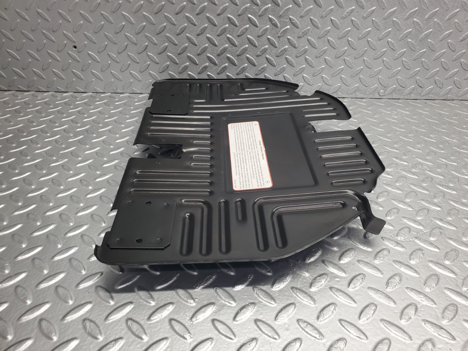 W124 Wagon front right floor relay cover used OEM