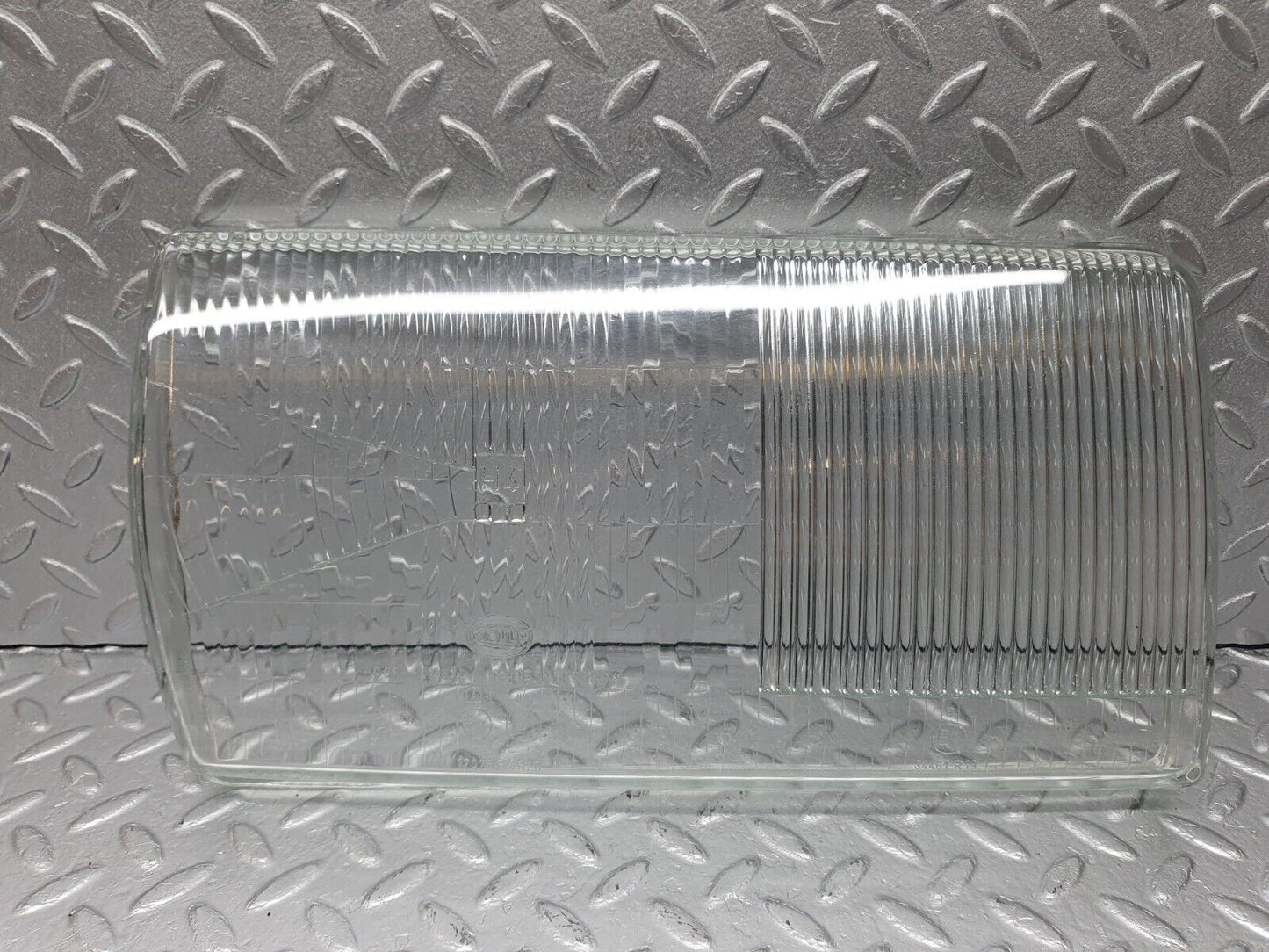 40723 Mercedes-Benz W123 300D Headlight Lens Right Hella 34461R19
