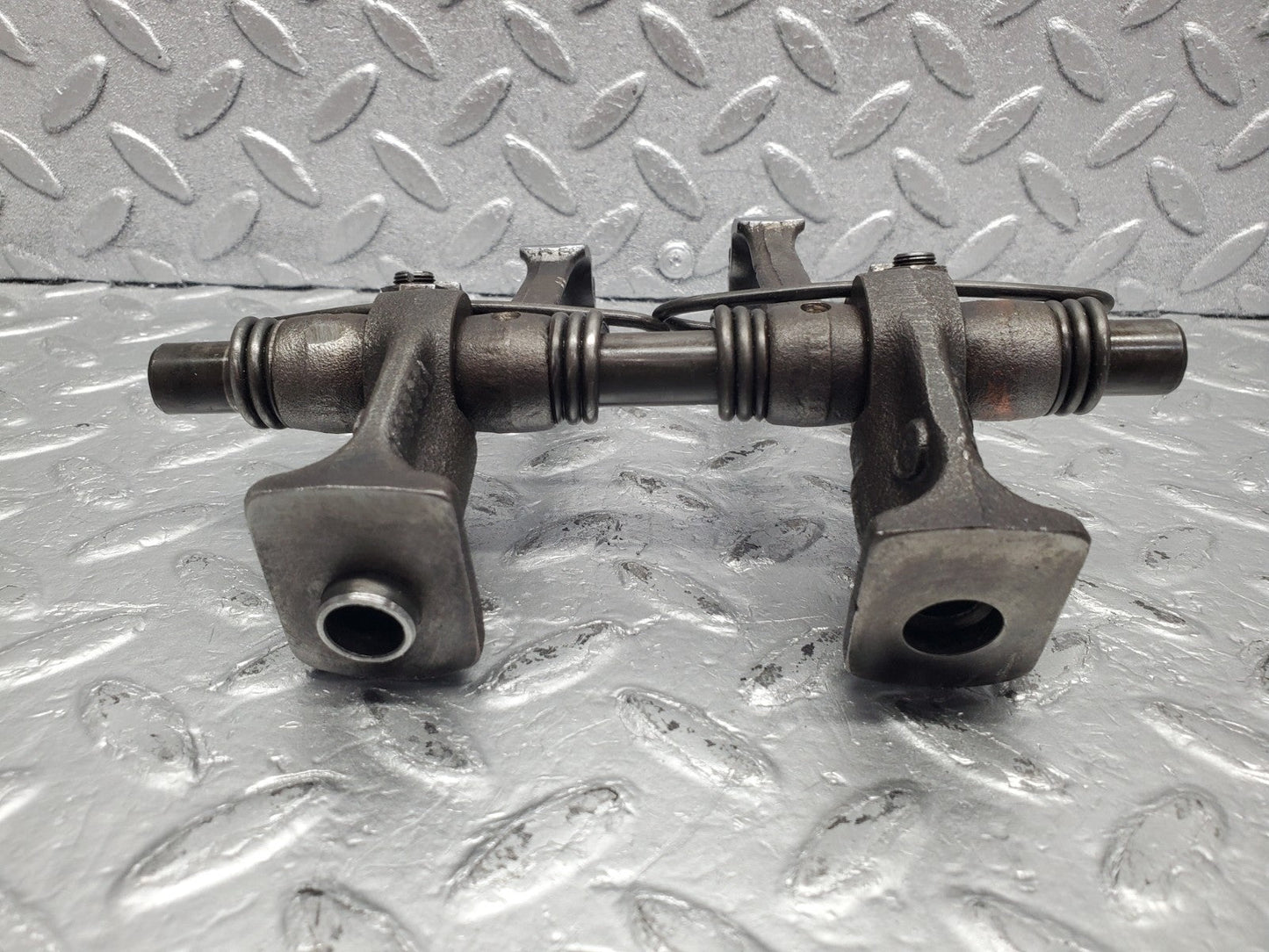 W112 rocker arm support with arm and shaft used OEM
