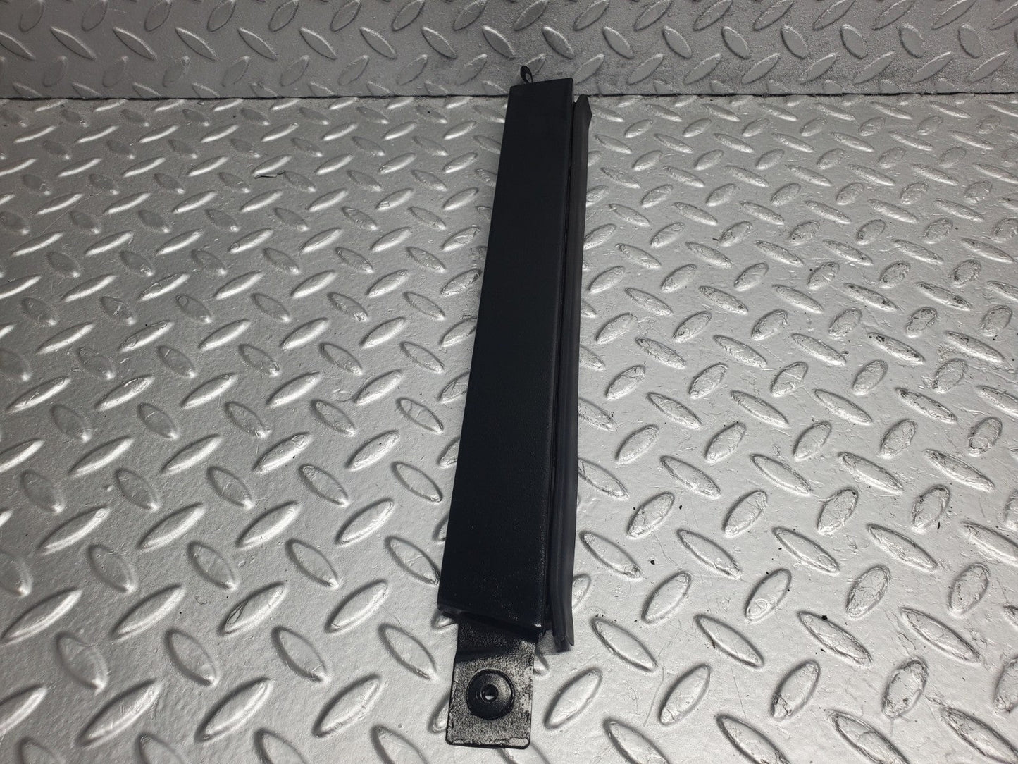 W124 Wagon under headlight trim right side used OEM