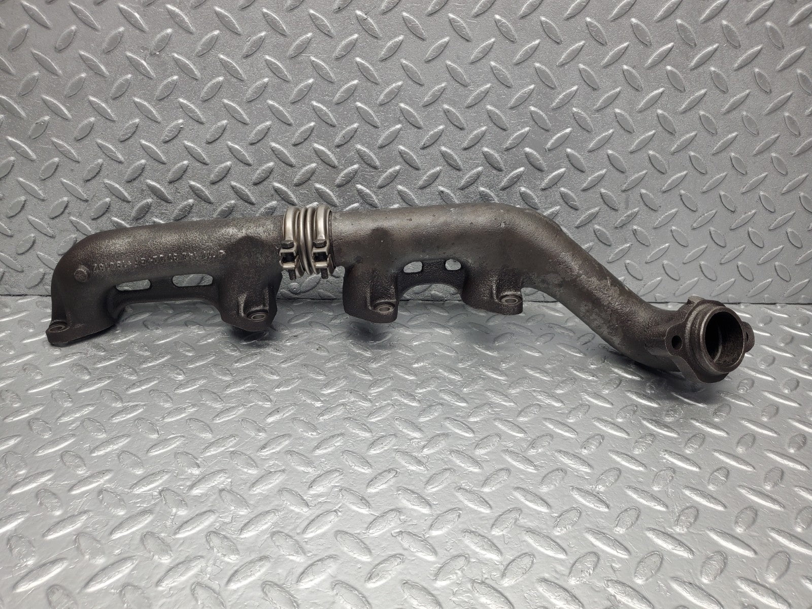 W126 Coupe exhaust manifold left used OEM