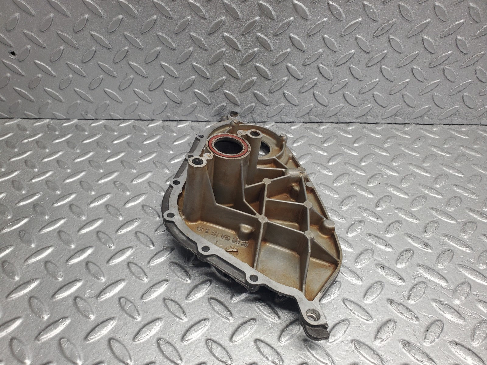 W124 Wagon cylinder head front cover used OEM