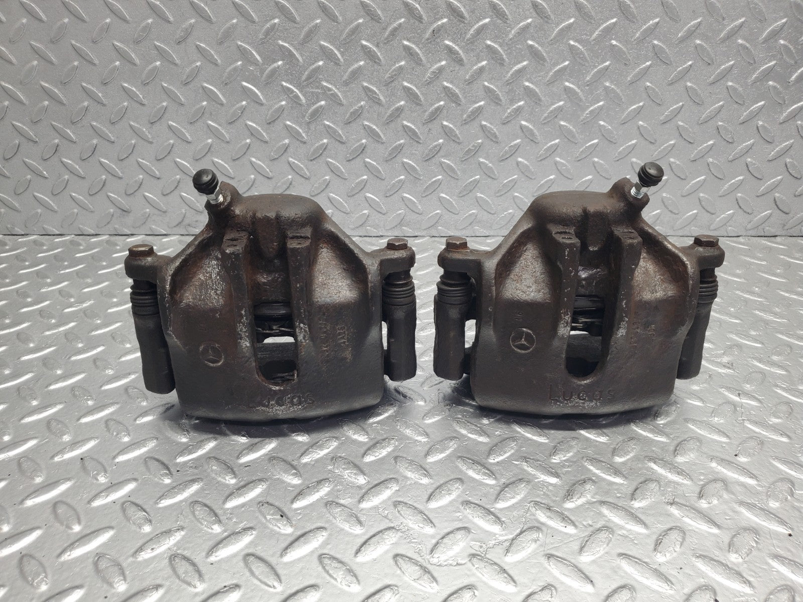 W124 Wagon front brake calipers with brackets used OEM