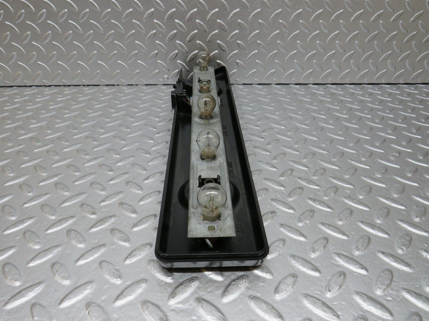 31054 Mercedes-Benz W123 200D Tail Light Bulb Holder Left Side 22064L