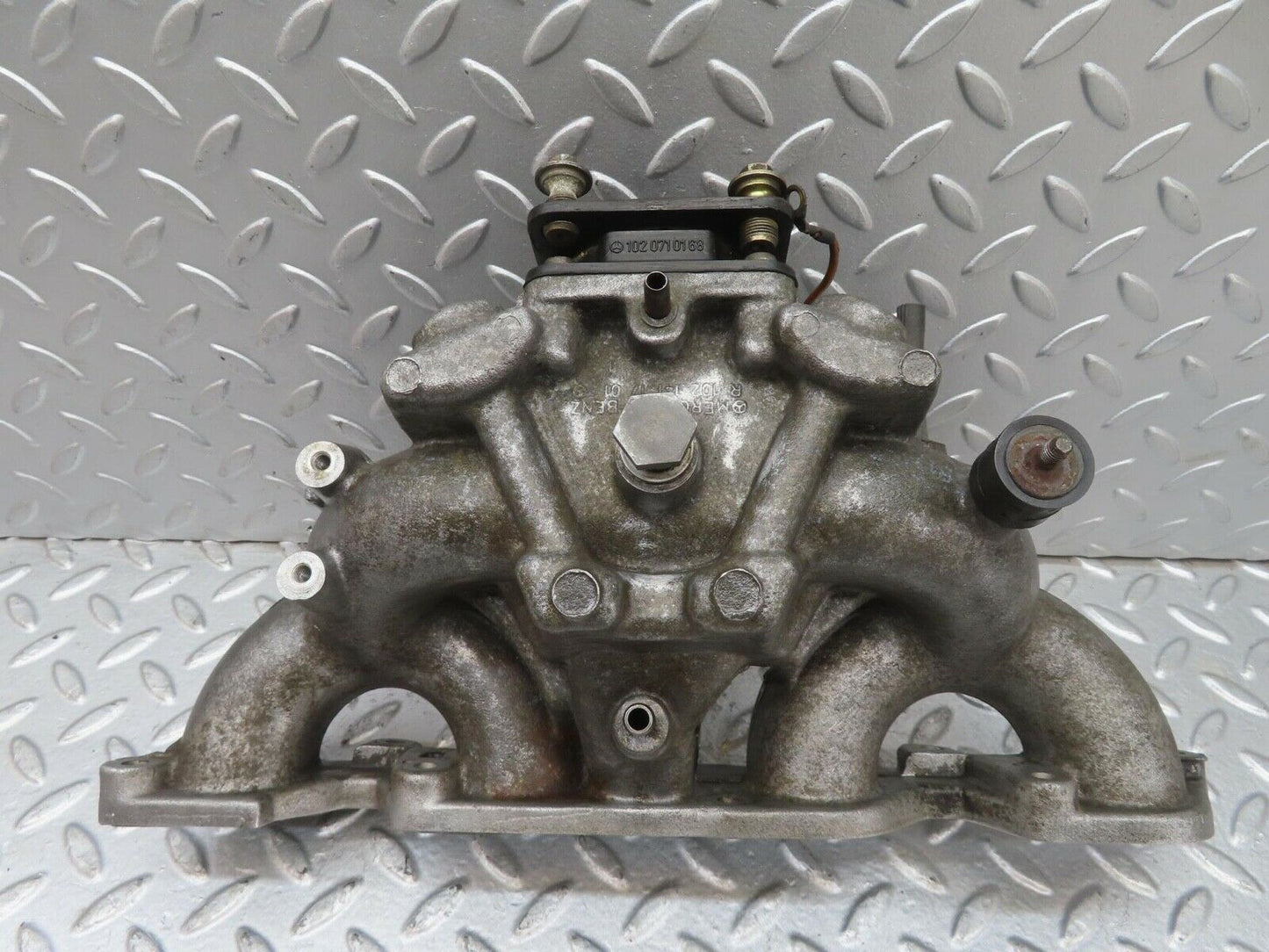 13582 Mercedes-Benz W123 200 Intake Manifold 1021411701