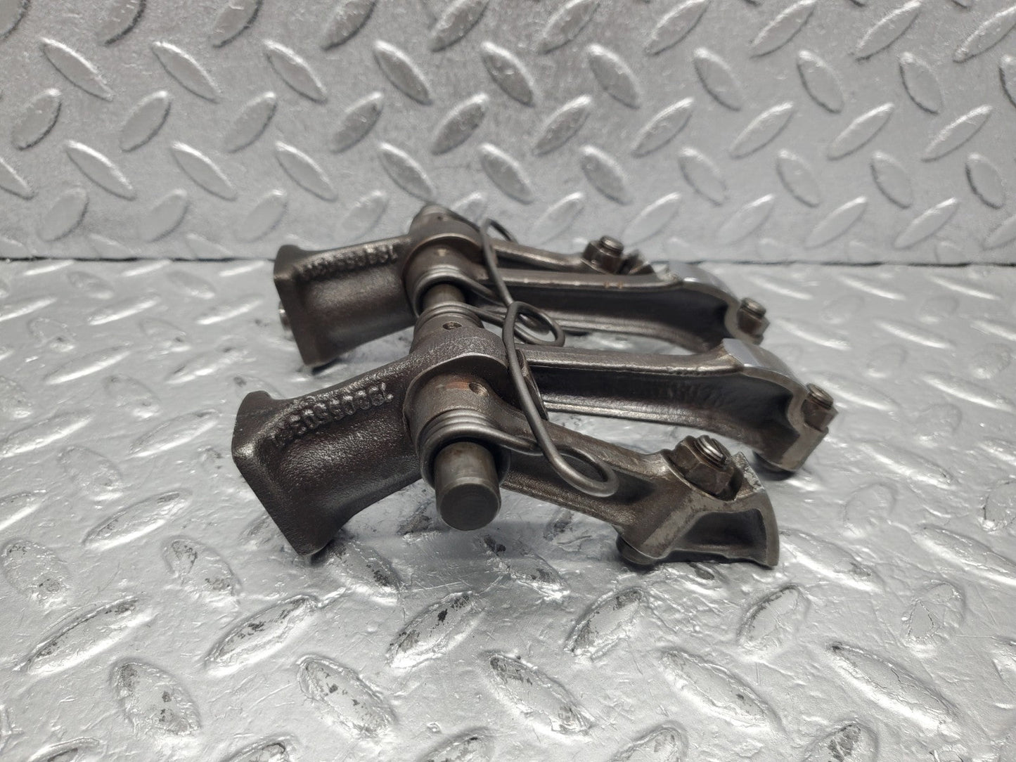 W112 rocker arm support with arm and shaft used OEM