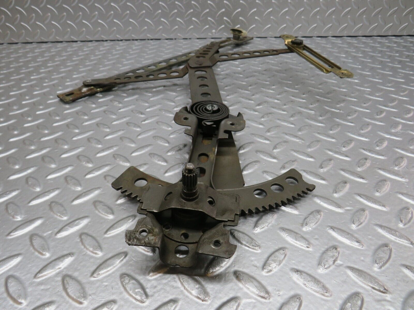 31140 Mercedes-Benz W123 200D Front Left Manual Window Regulator 1237200346
