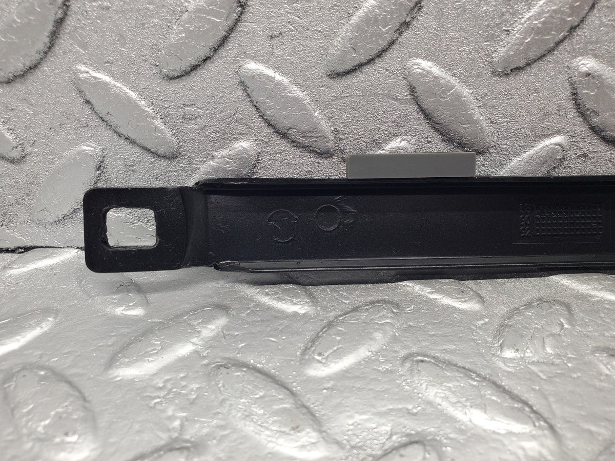 W201 Baby Benz under headlight trim left used OEM