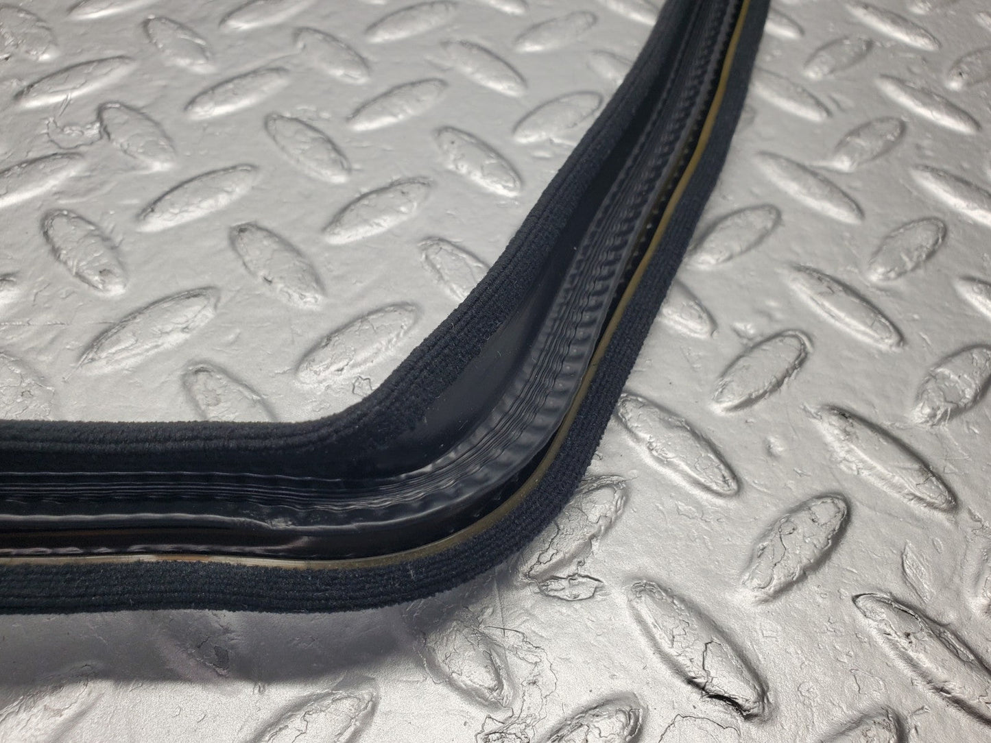 W201 Baby Benz front left door edge seal black used OEM