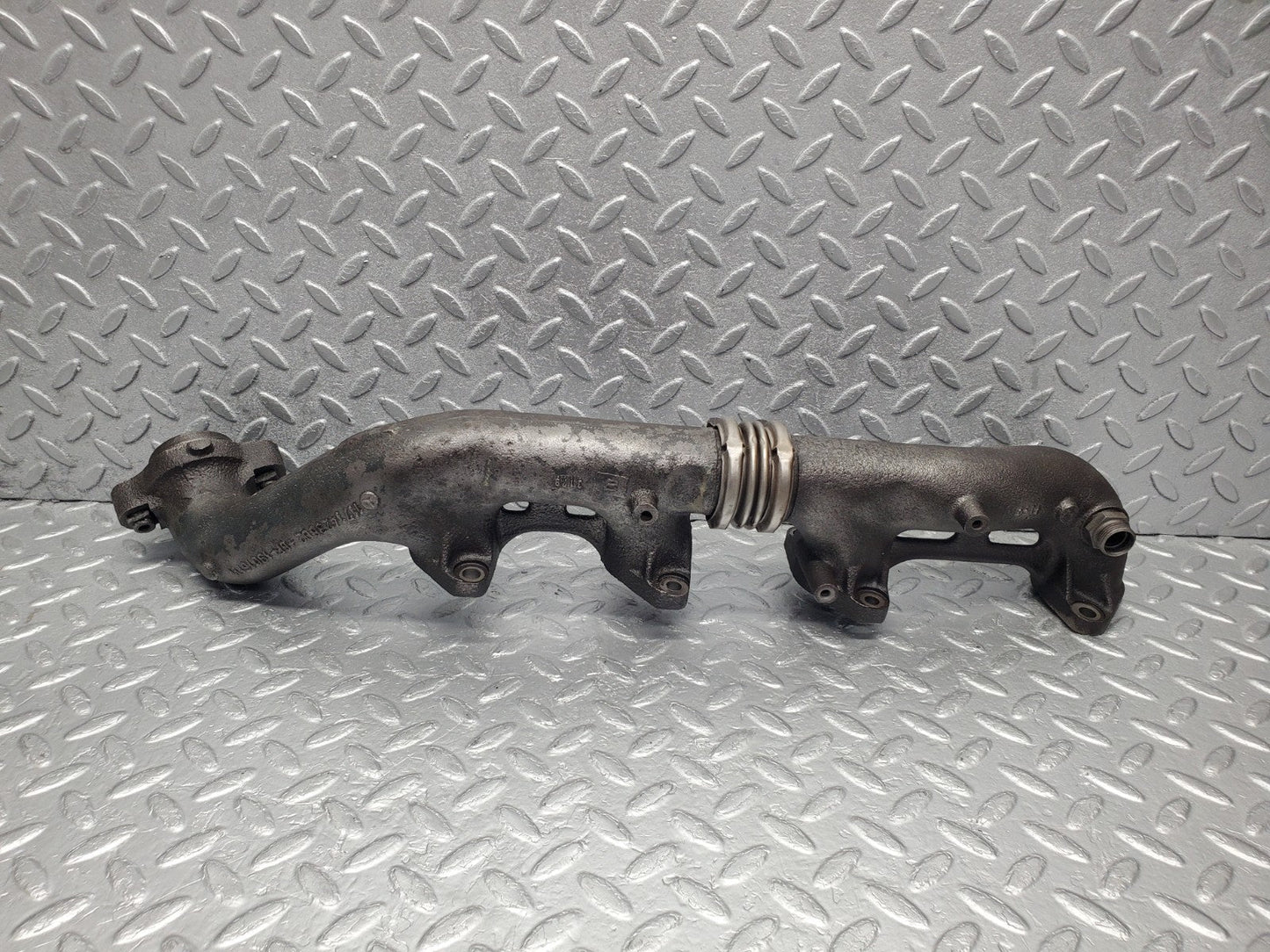 W126 Coupe exhaust manifold left used OEM