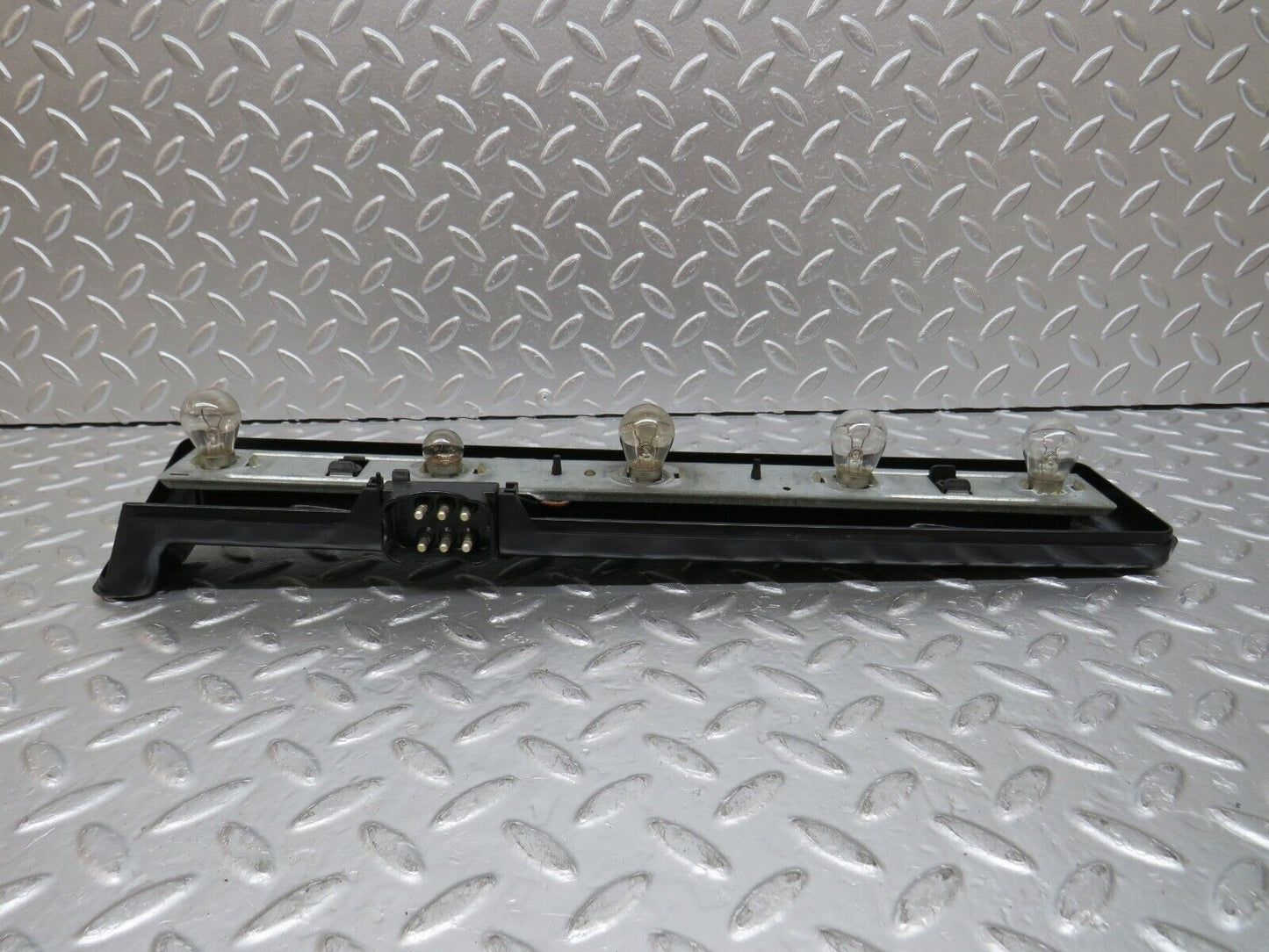 31054 Mercedes-Benz W123 200D Tail Light Bulb Holder Left Side 22064L