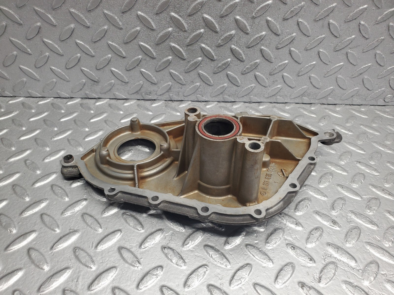 W124 Wagon cylinder head front cover used OEM