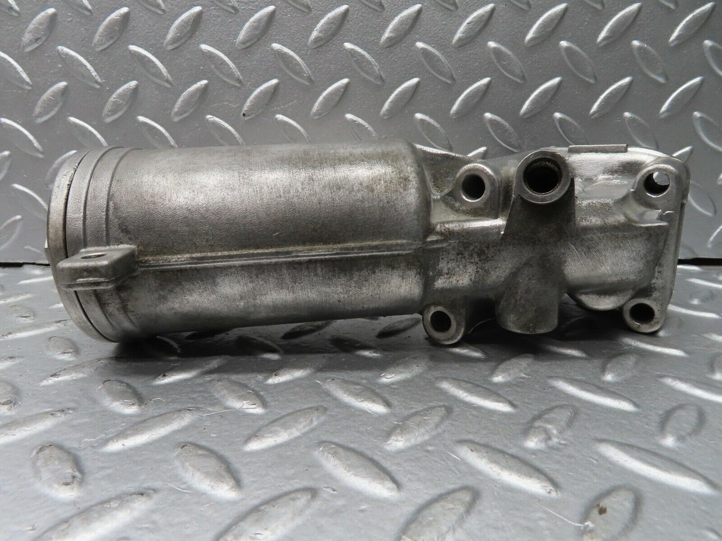 21357 Mercedes-Benz W123 230E Oil Filter Housing 1021800711