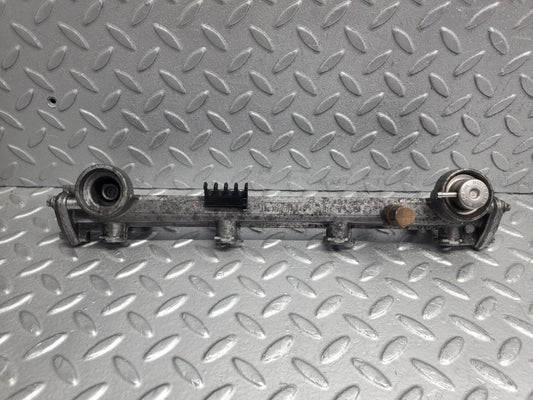 W124 Wagon fuel injector rail used OEM
