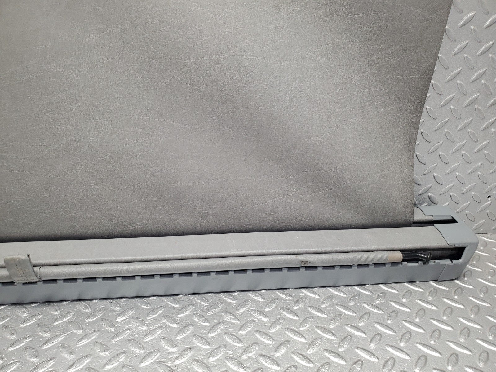 W124 Wagon trunk roll compartment cover used OEM