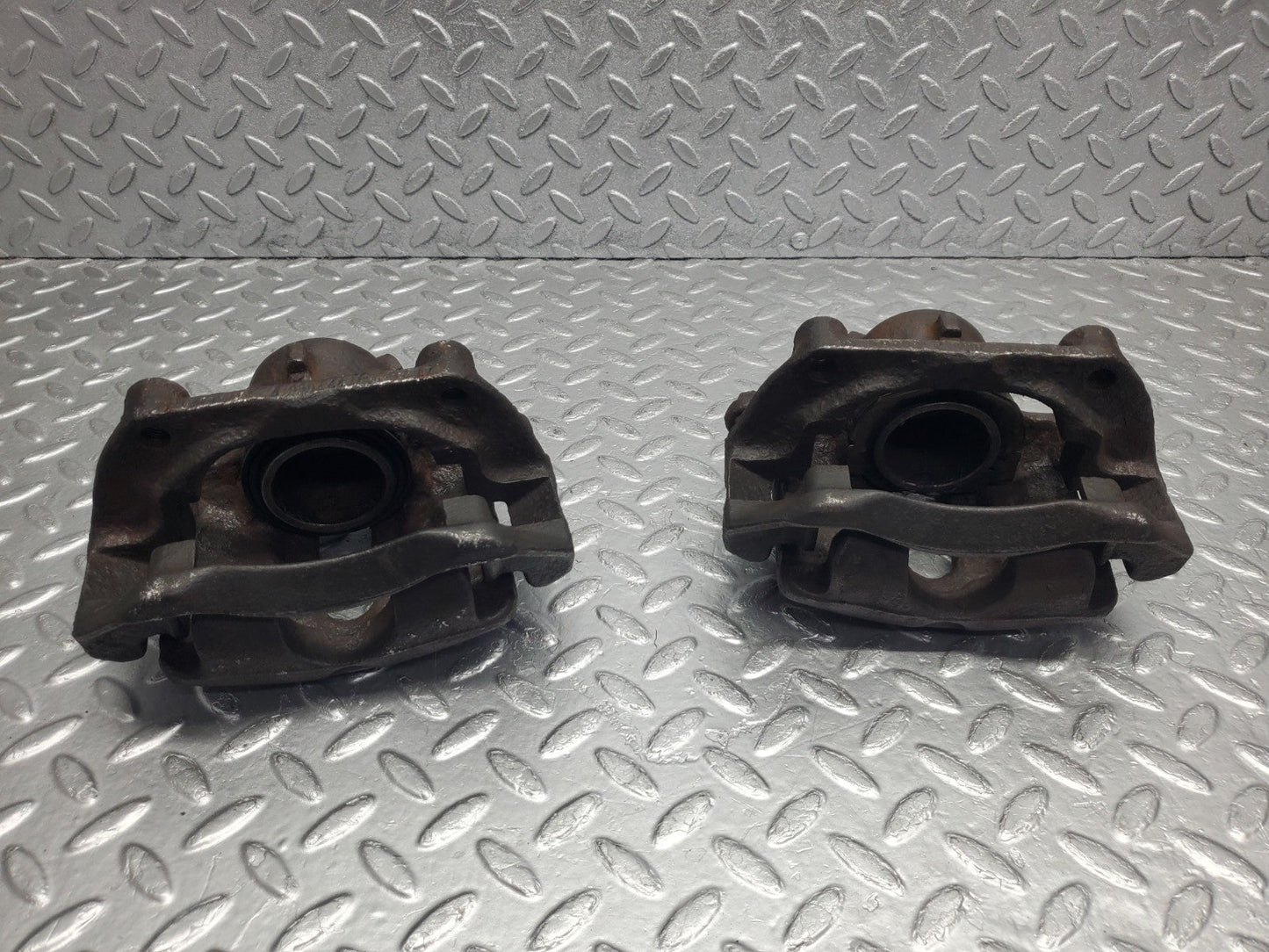 W124 Wagon front brake calipers with brackets used OEM