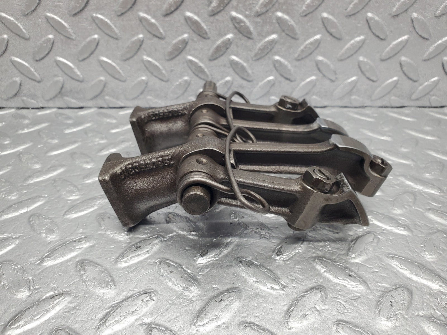 W112 rocker arm support arm and shaft used OEM