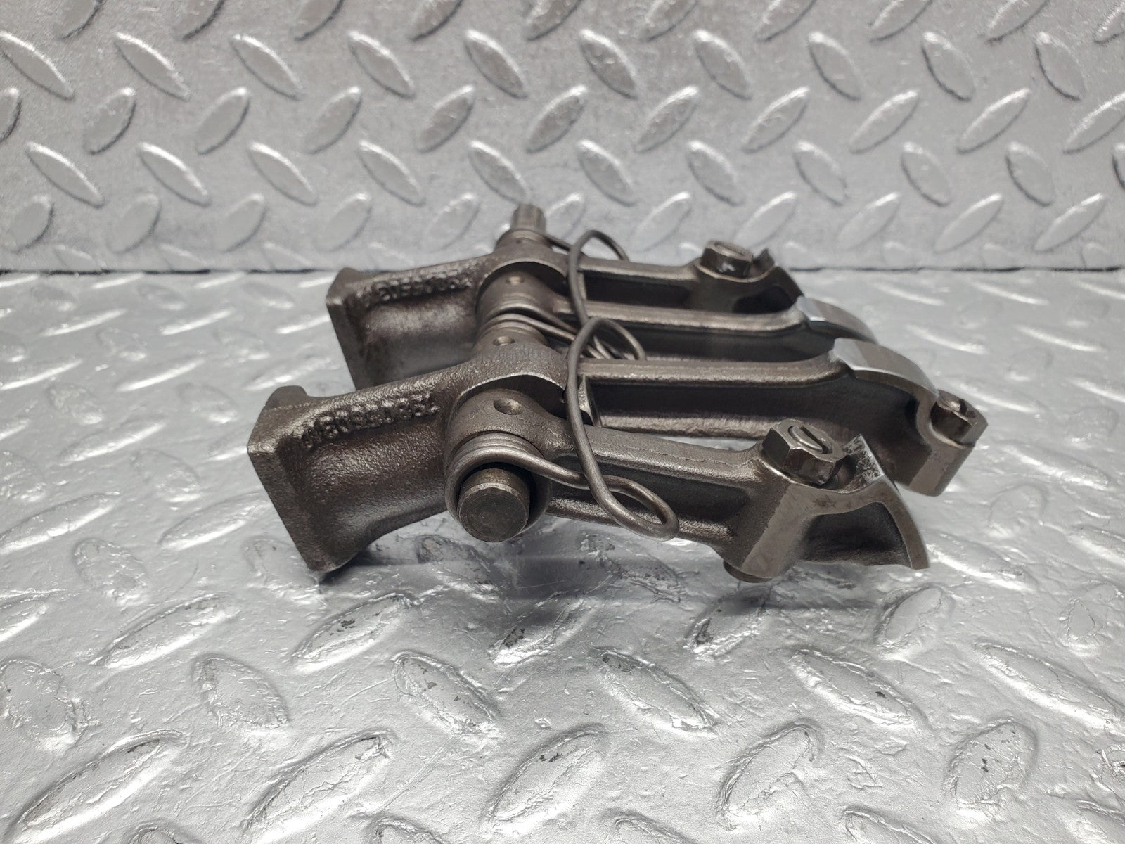 W112 rocker arm support arm and shaft used OEM
