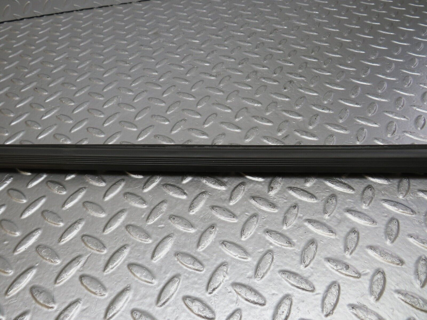 34220 Mercedes-Benz W124 260E Door Lower Sealing Rubber Trim Left