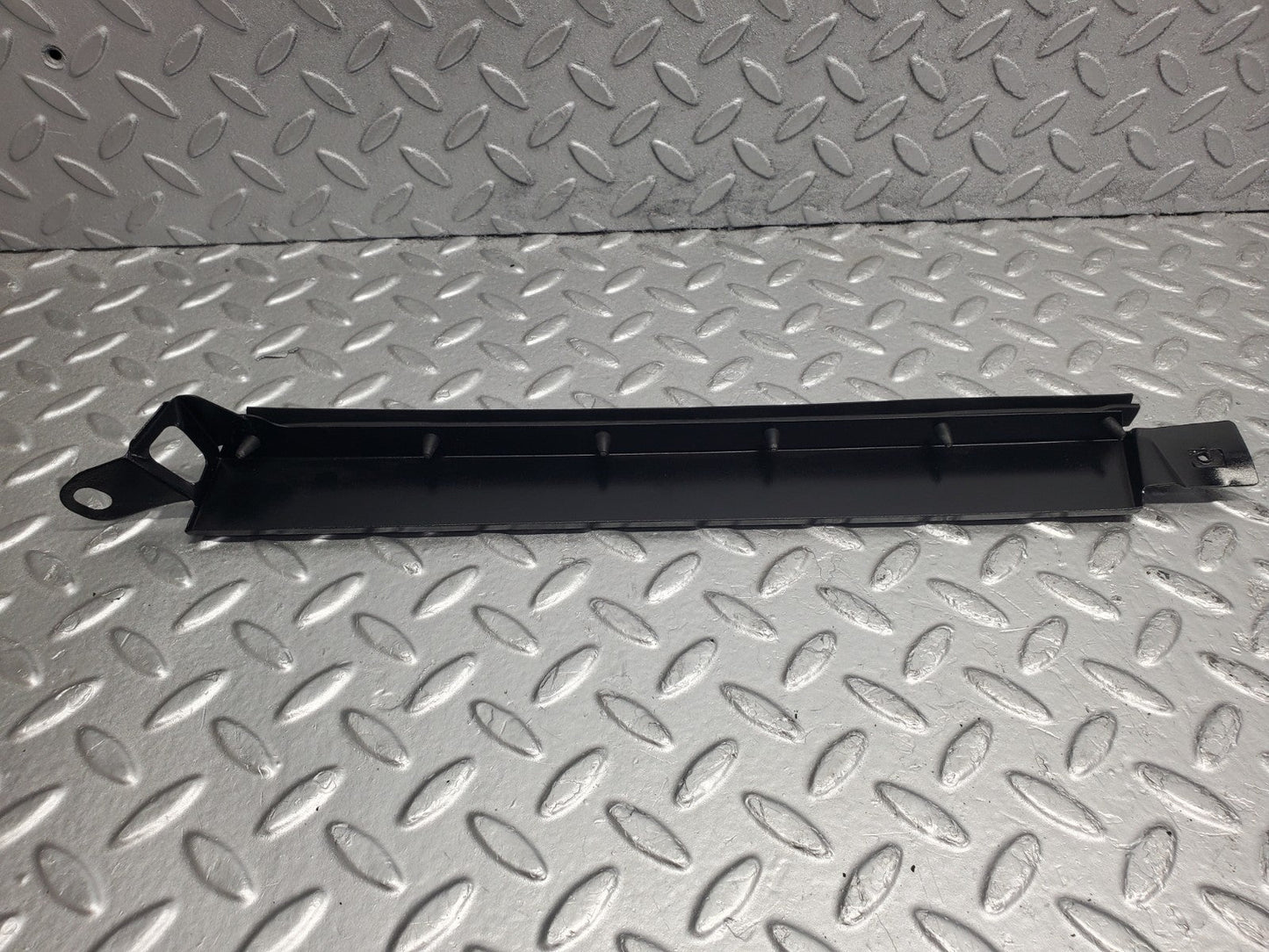 W124 Wagon under headlight trim right side used OEM