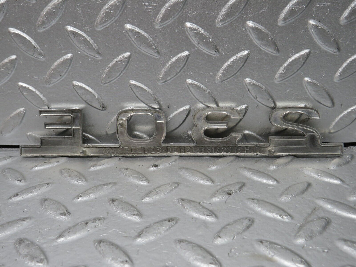 32050 Mercedes-Benz W123 230E Trunk Badge Logo Emblem 1238172015