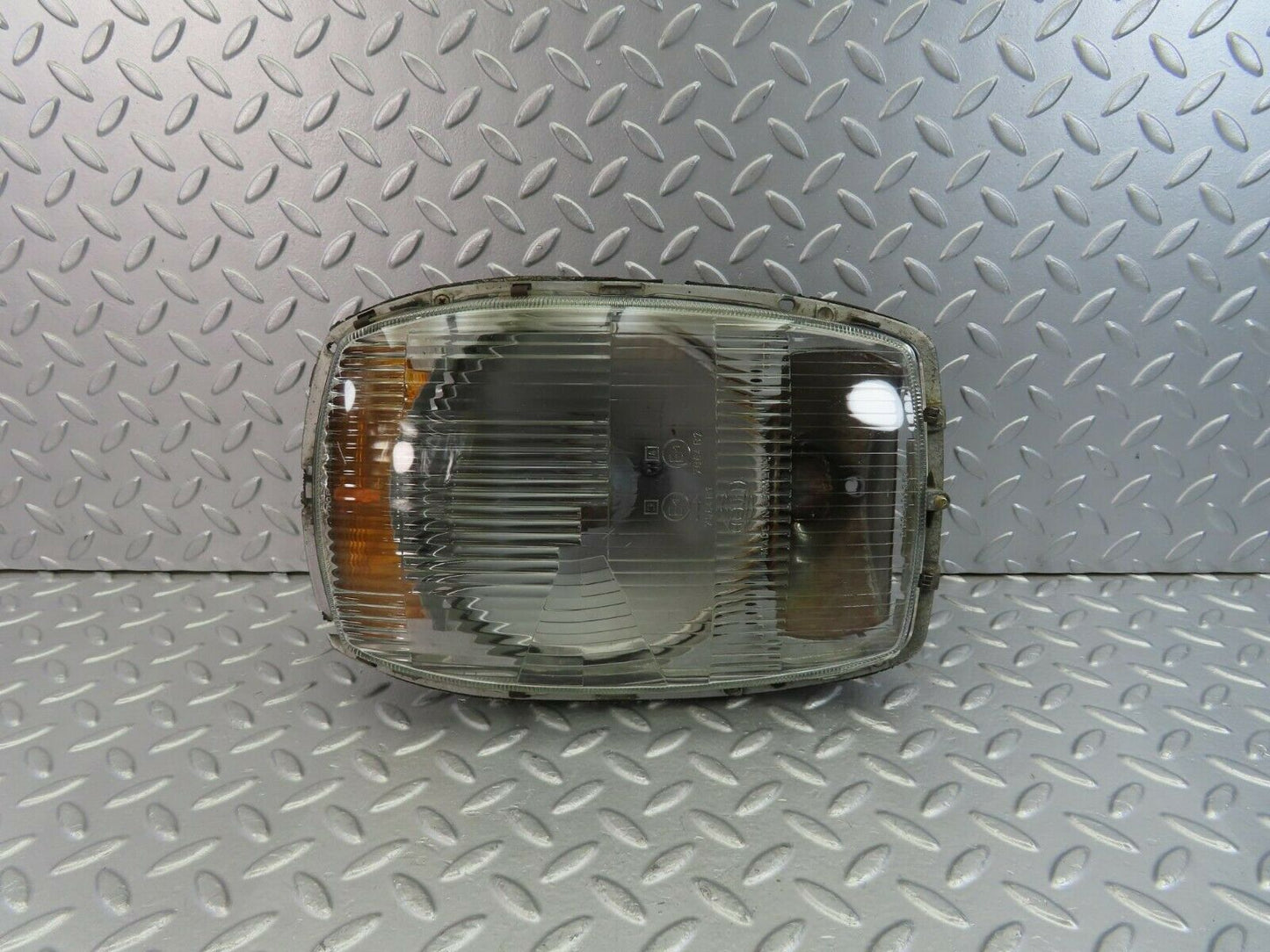 10635 Mercedes-Benz W115 Pre Facelift Headlight Hella Left or Right