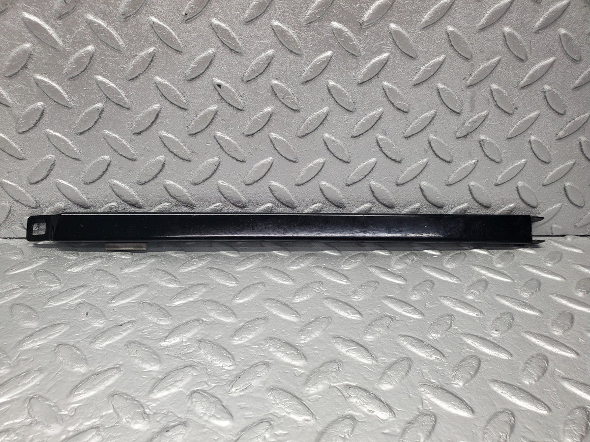 W201 Baby Benz under headlight trim left used OEM