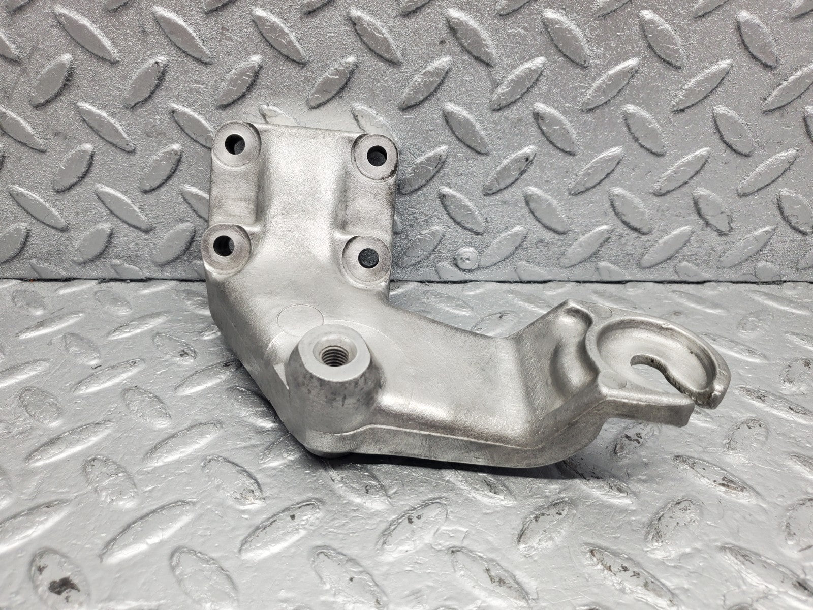 W126 Coupe engine mount bracket left used OEM