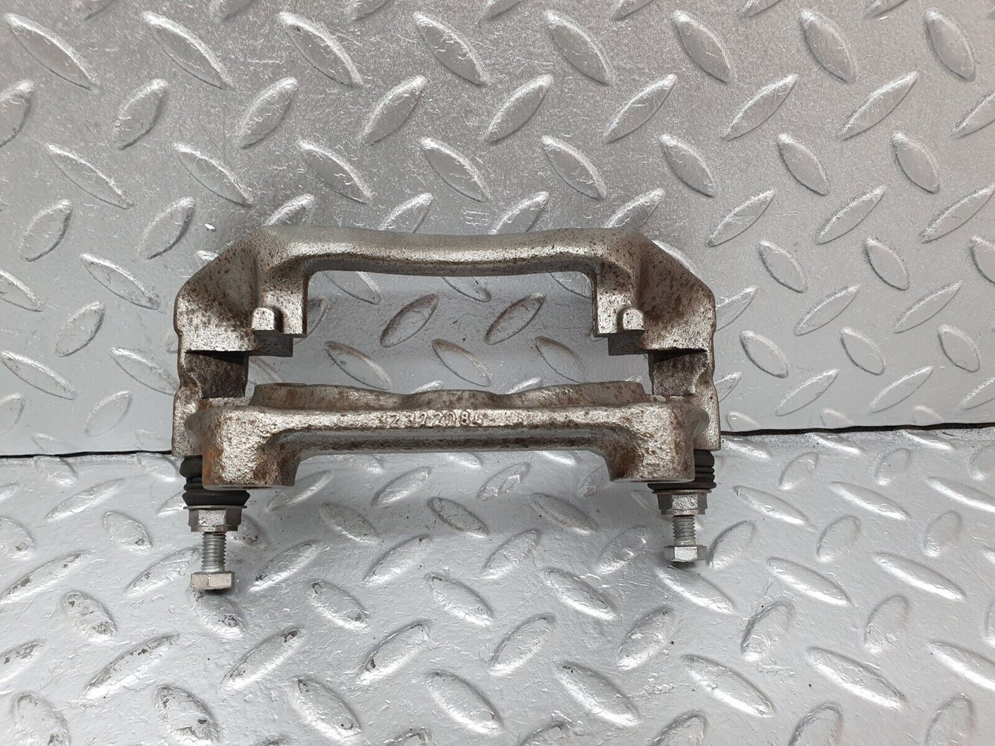 41612 Mercedes-Benz W124 200E Front Left Brake Caliper Bracket