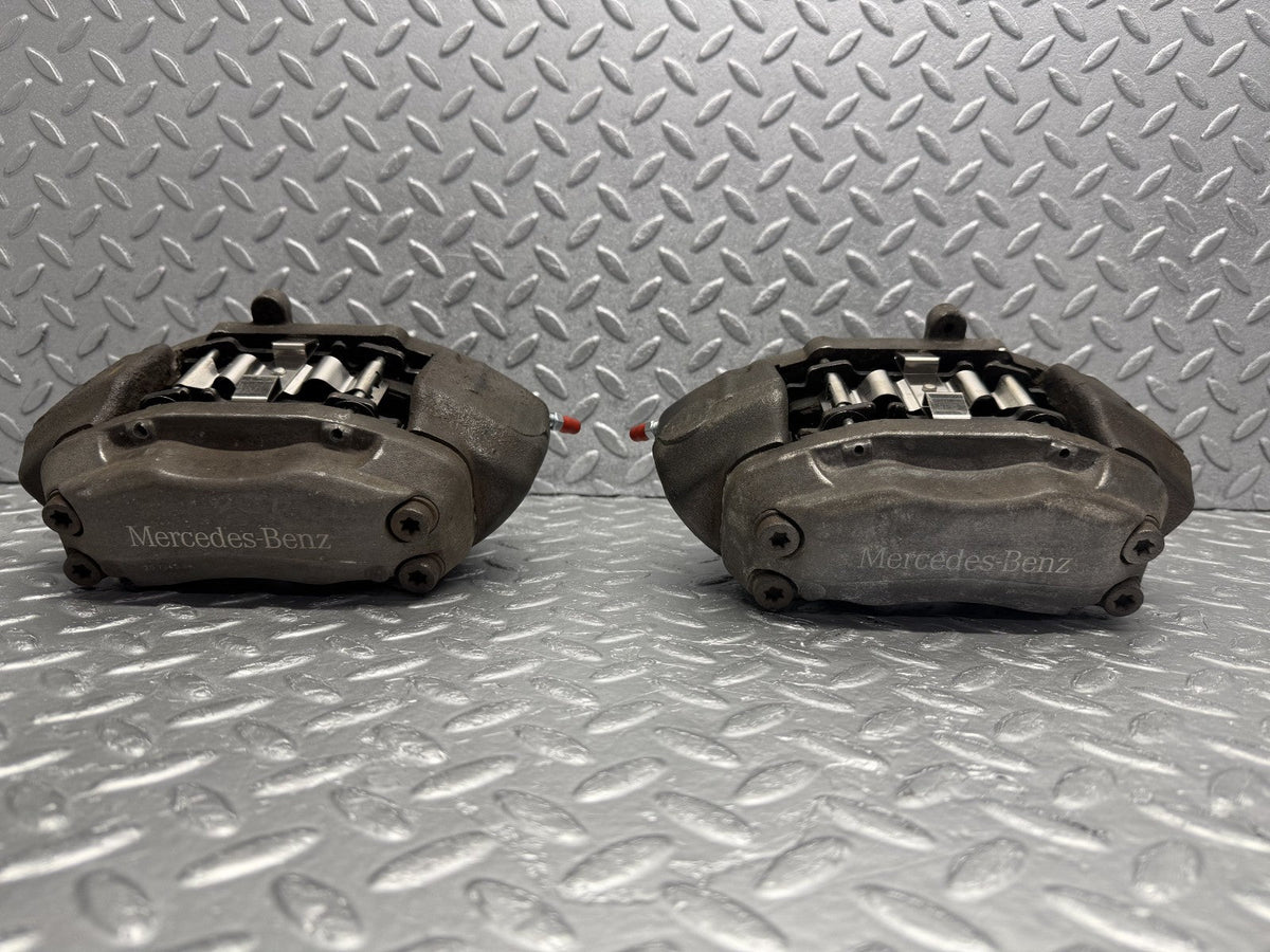 R230 front brake caliper right and left used OEM