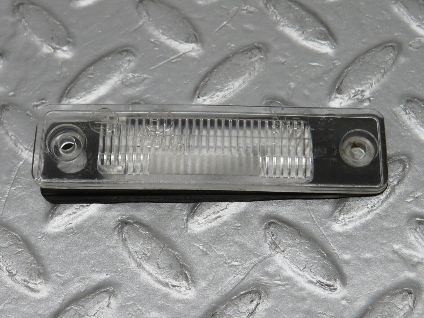39136 Mercedes-Benz R107 500SL number Plate Light Lens 12981R4
