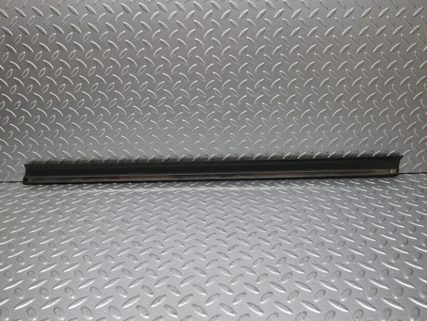 30793 Mercedes-Benz W201 190E 2.0L Front Left Door Lower Moulding Trim