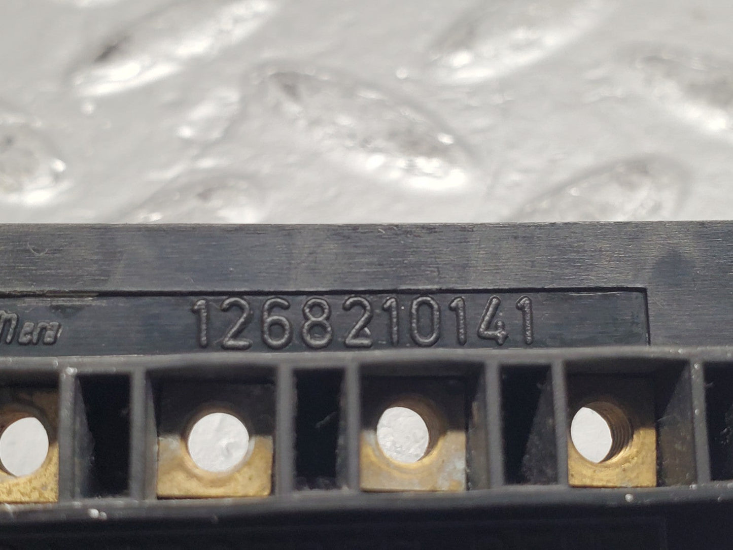 47077164
