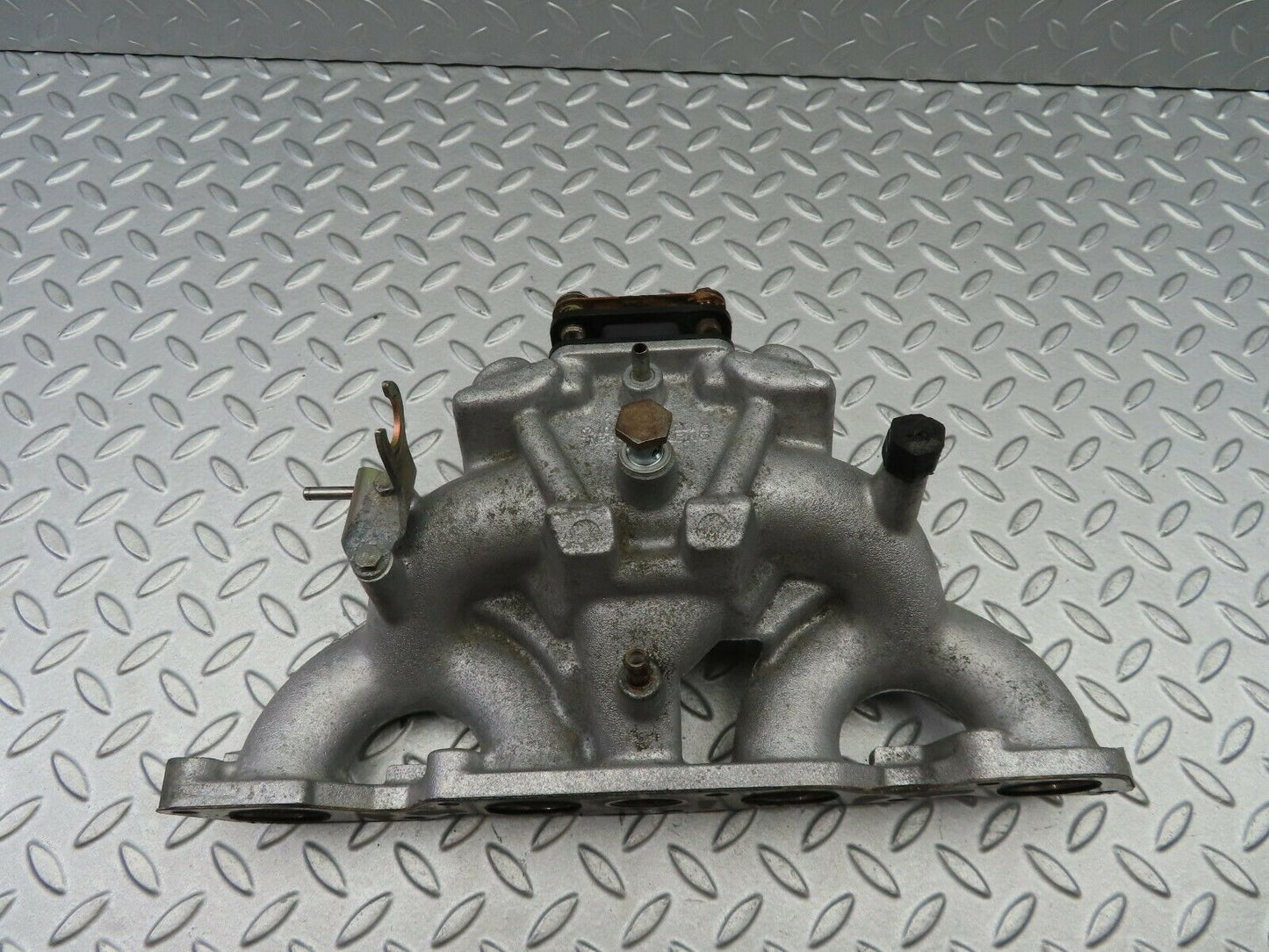 6020 Mercedes-Benz W123 200 Intake Manifold 1021411601