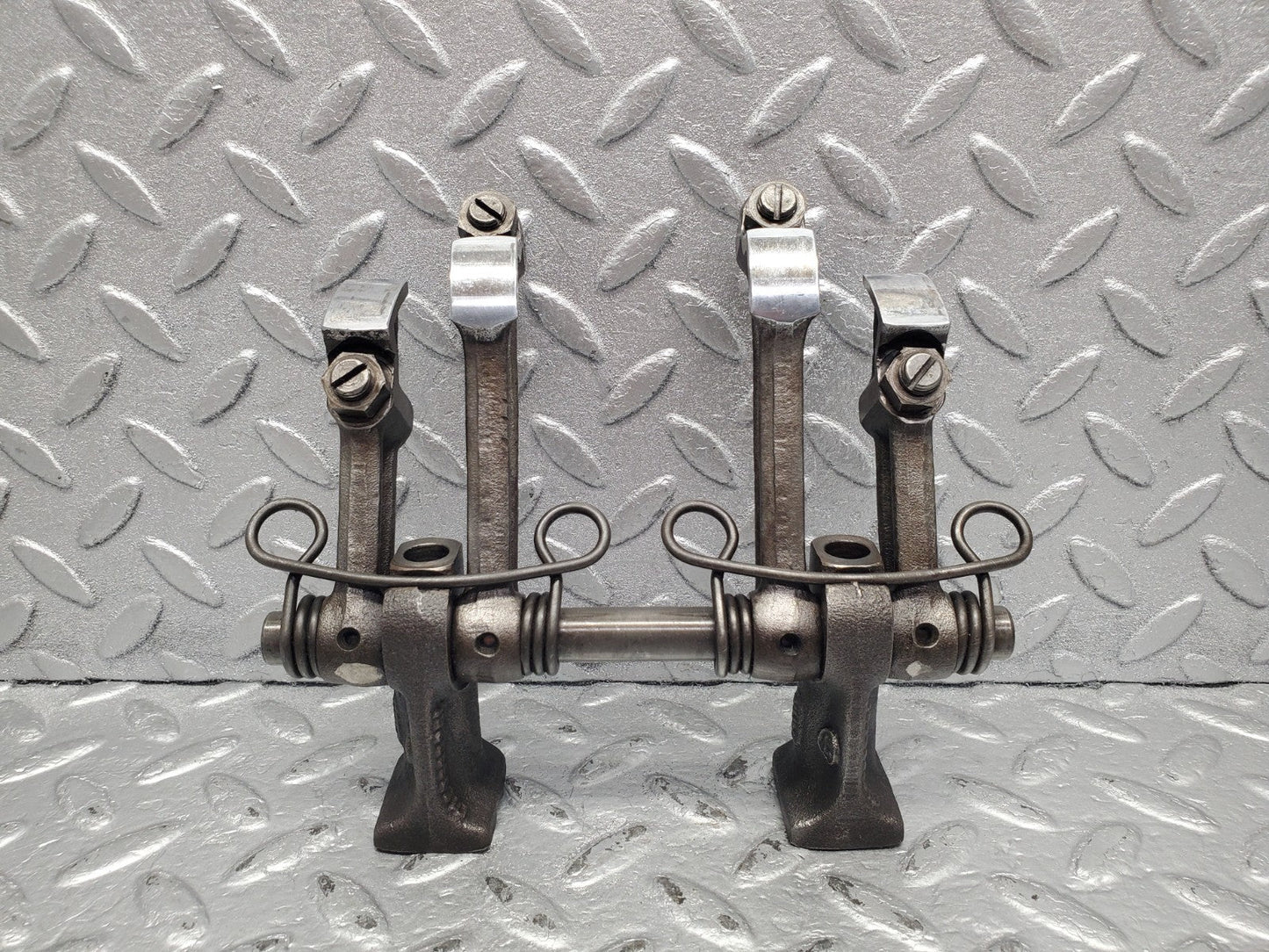 W112 rocker arm support with arm and shaft used OEM