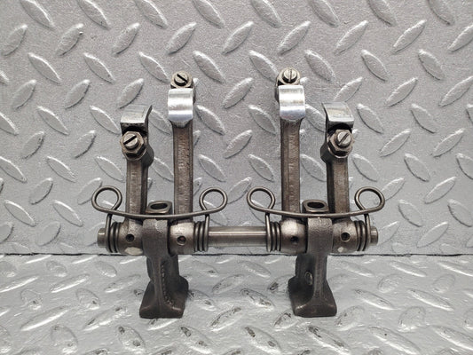 W112 rocker arm support with arm and shaft used OEM