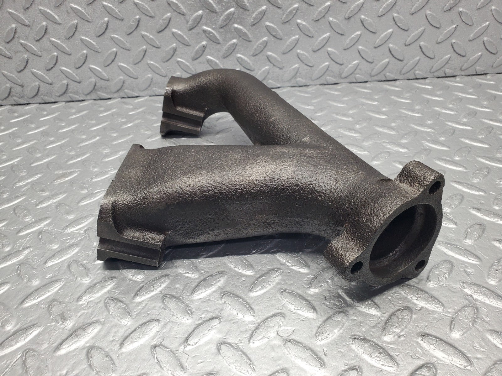 W112 exhaust manifold 4-6 used OEM