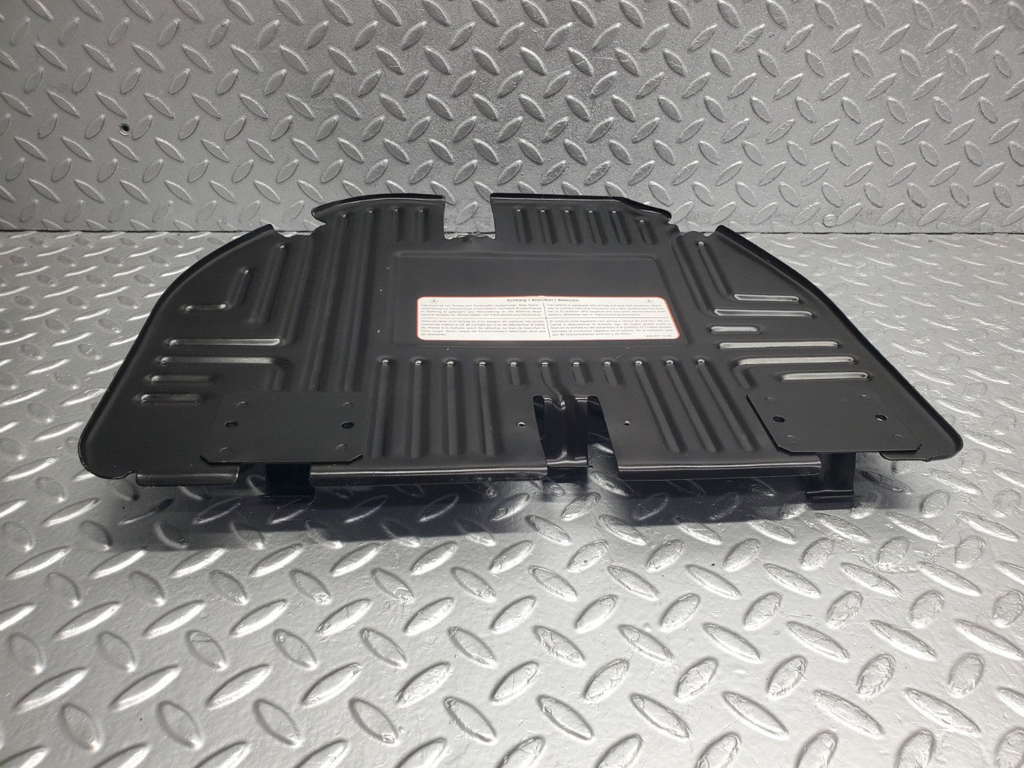 W124 Wagon front right floor relay cover used OEM