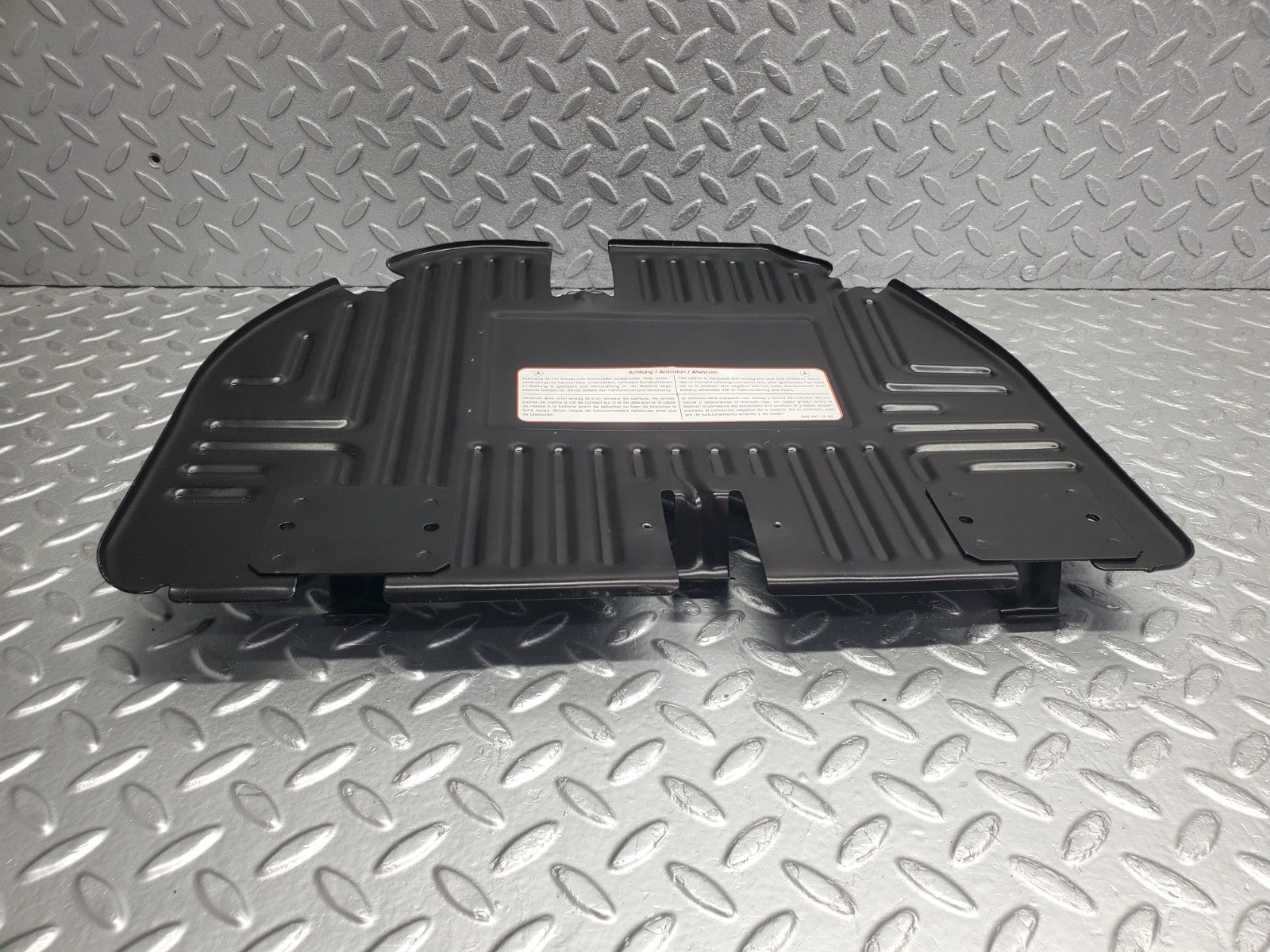 W124 Wagon front right floor relay cover used OEM