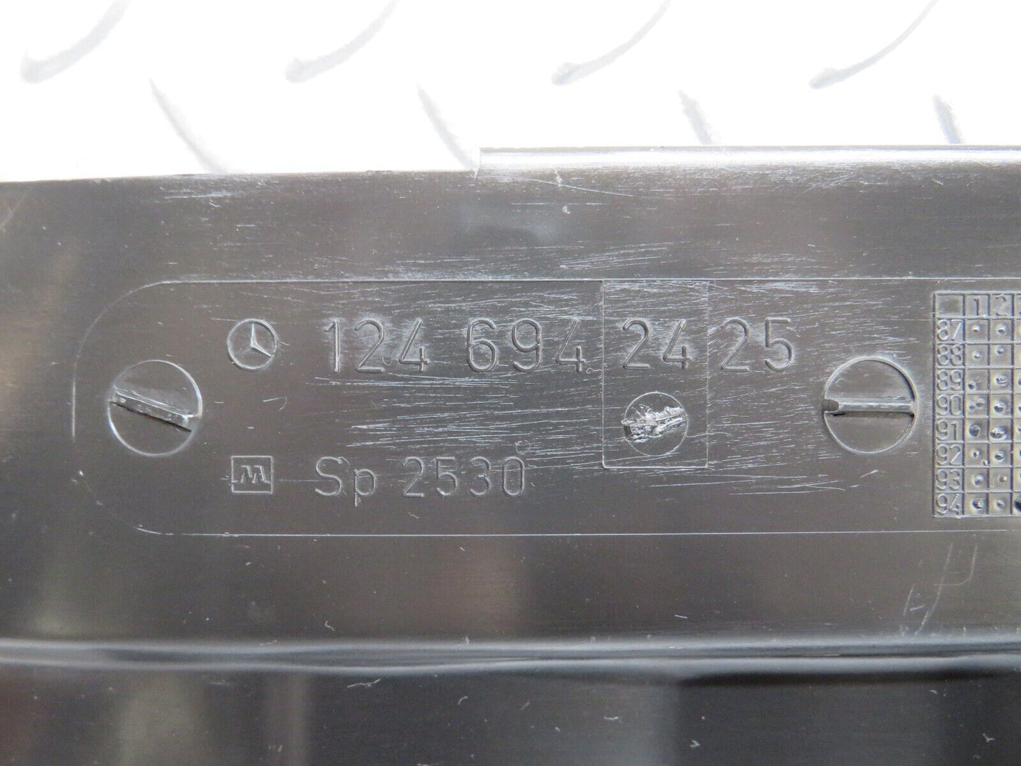 25888 Mercedes-Benz W124 280E Trunk Lock Trim Panel 1246942425