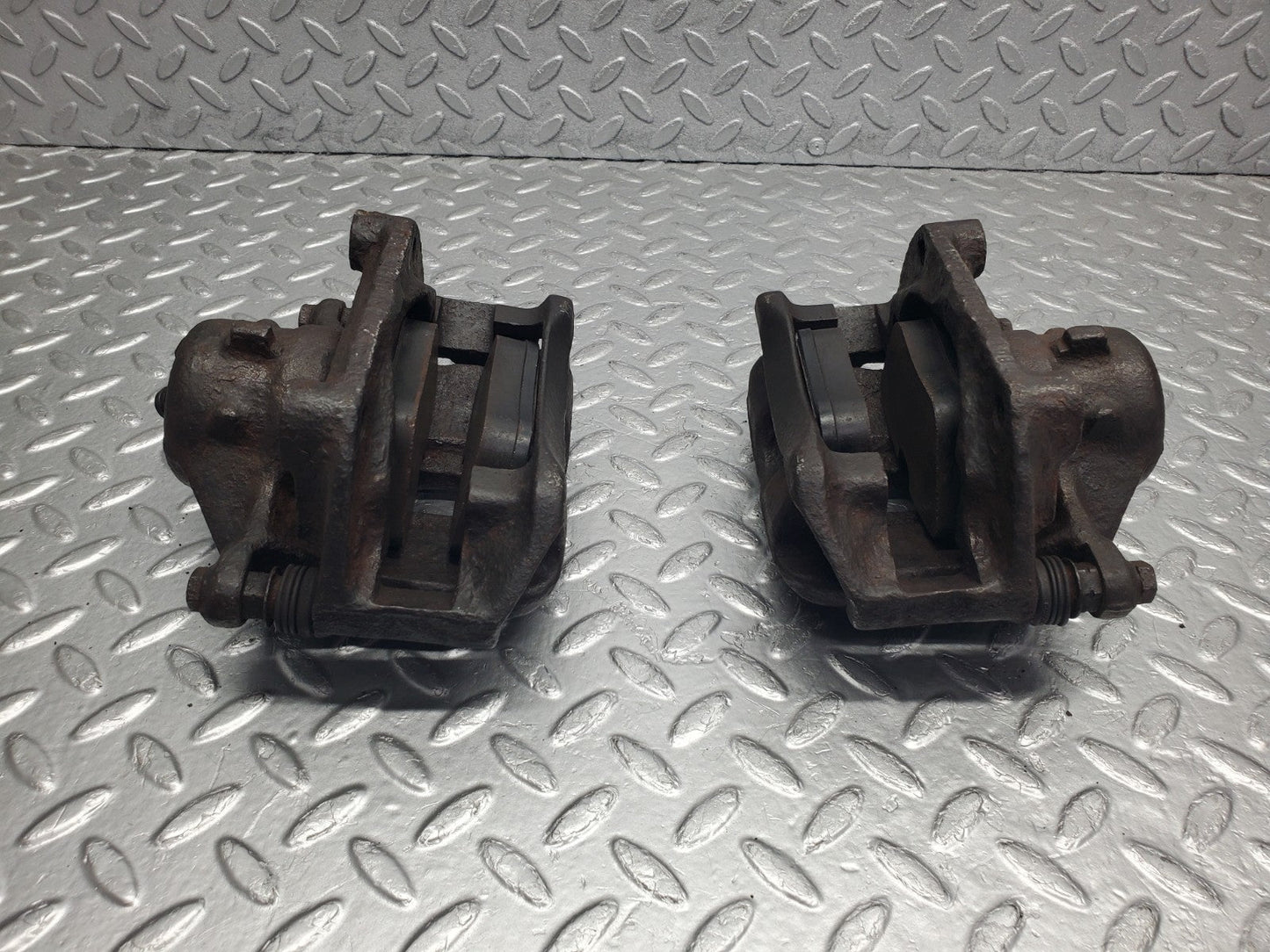 W124 Wagon front brake calipers with brackets used OEM