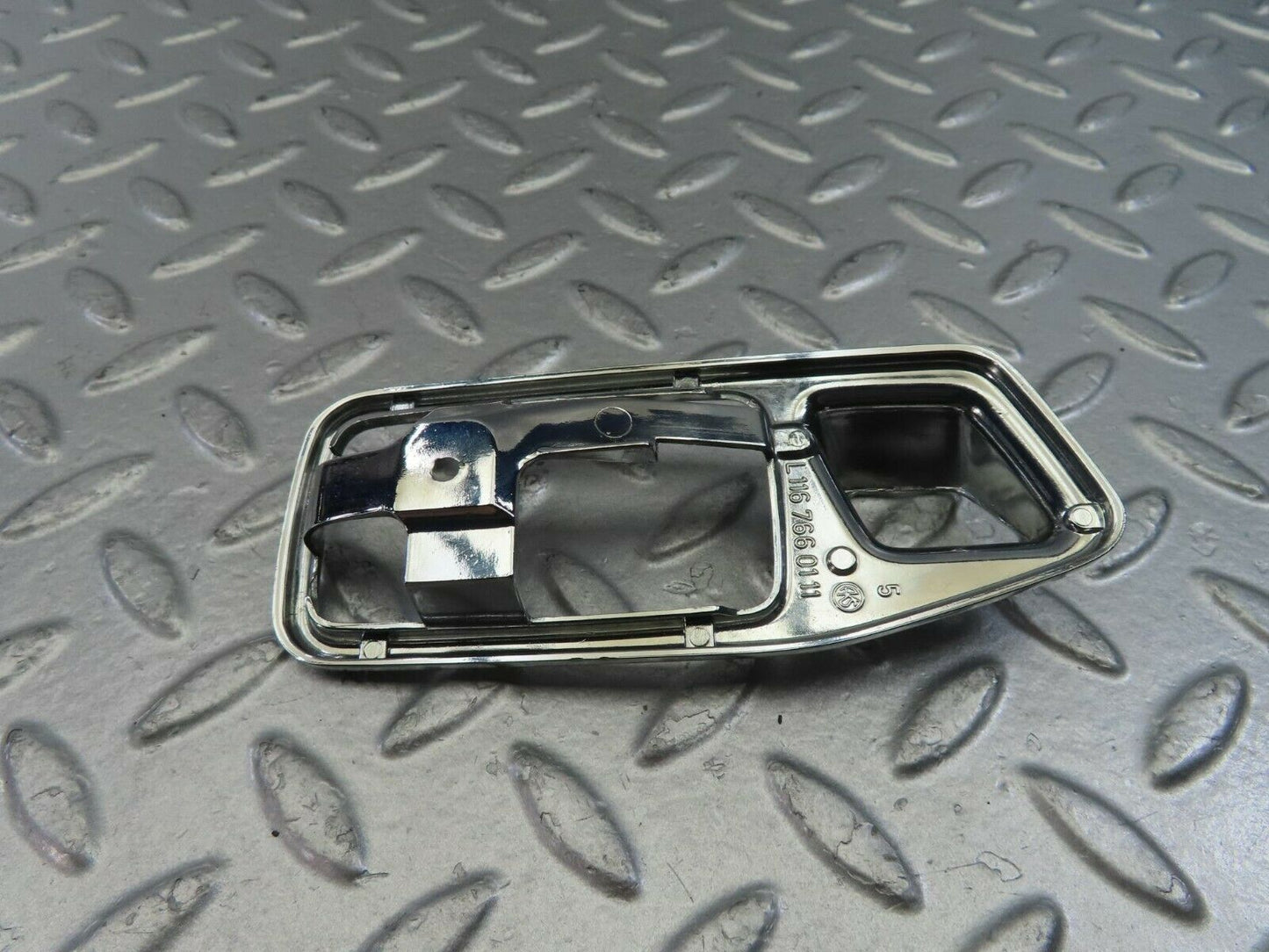 10833 Mercedes-Benz W123 230E Chrome Frame For Door Opener Left 1167660111