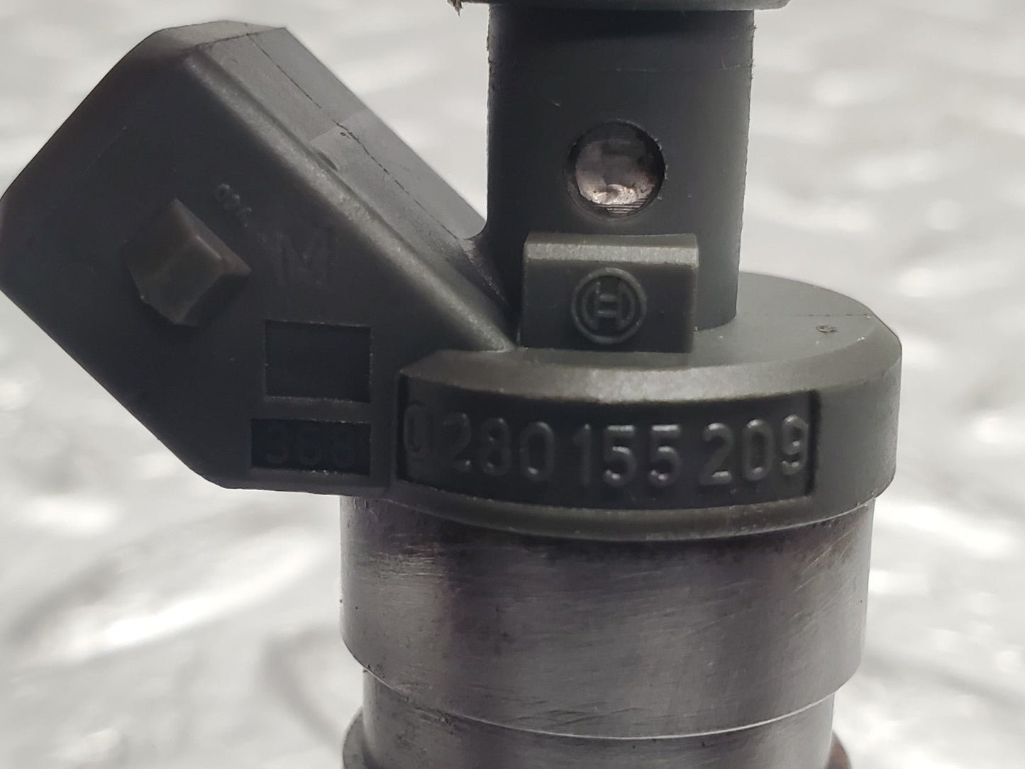 46977105