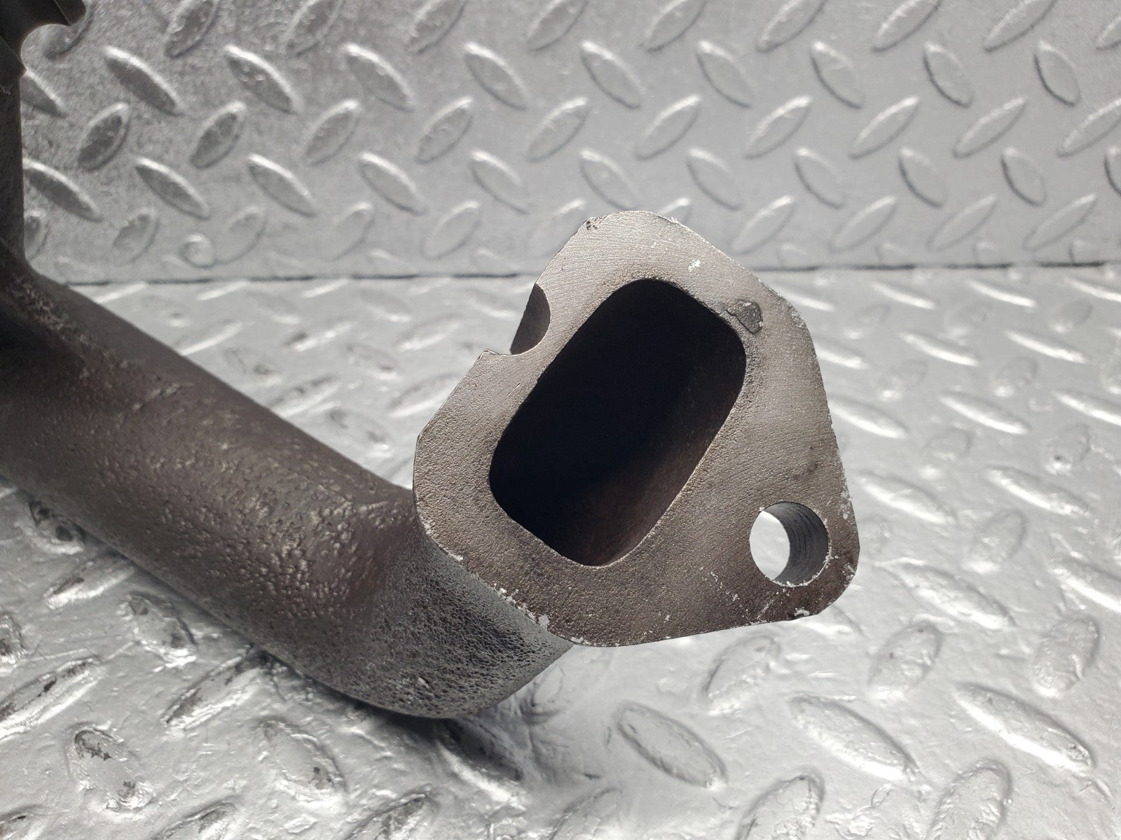 W112 exhaust manifold 4-6 used OEM