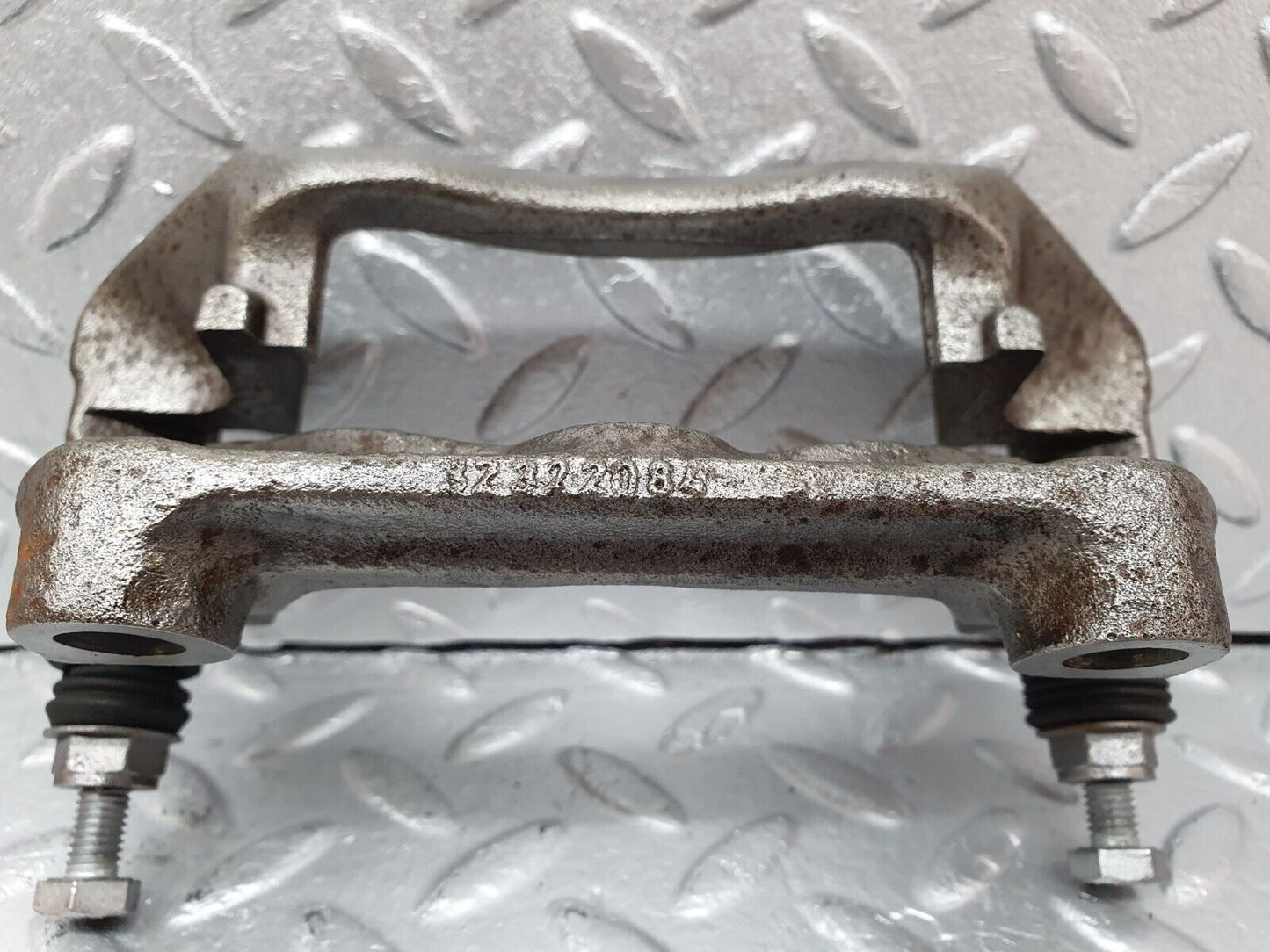 41612 Mercedes-Benz W124 200E Front Left Brake Caliper Bracket