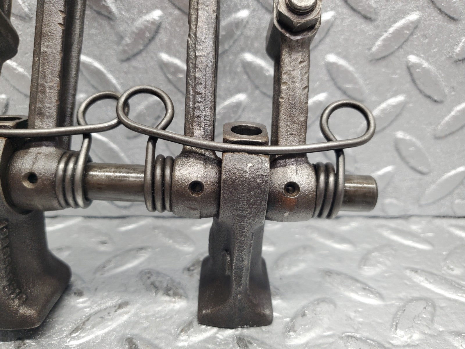 W112 rocker arm support with arm and shaft used OEM